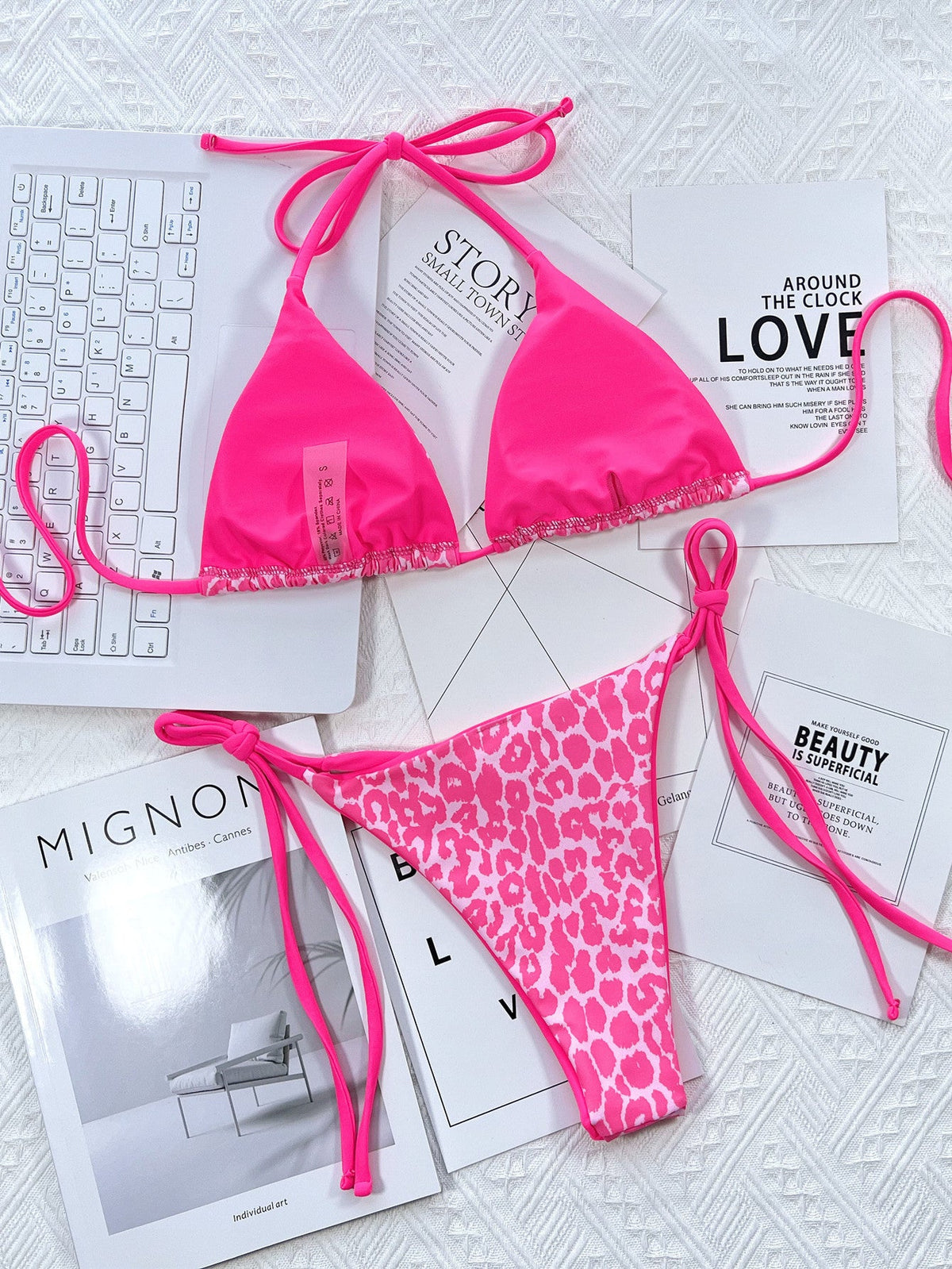 Leopard print halter neck tie side bikini set in vibrant pink.