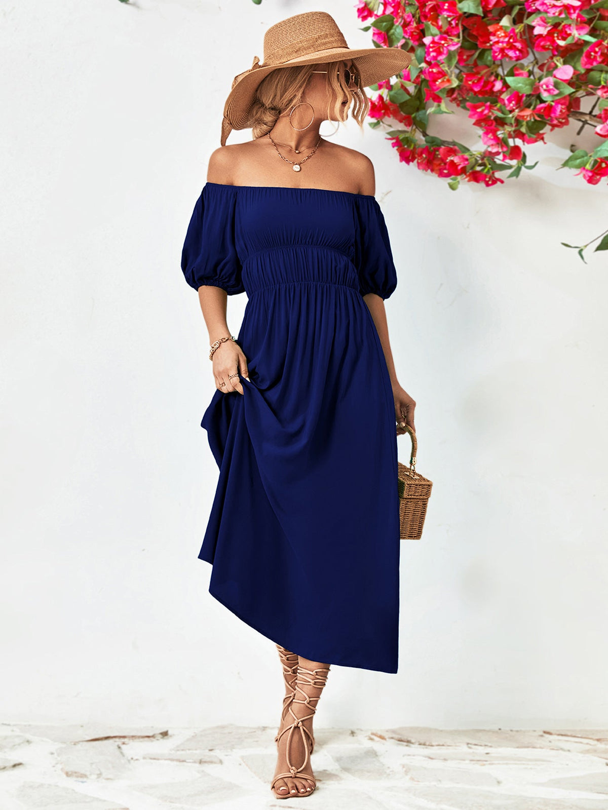 Off-shoulder balloon sleeve midi dress with puff sleeves and A-line hem in solid blue, chic style.
