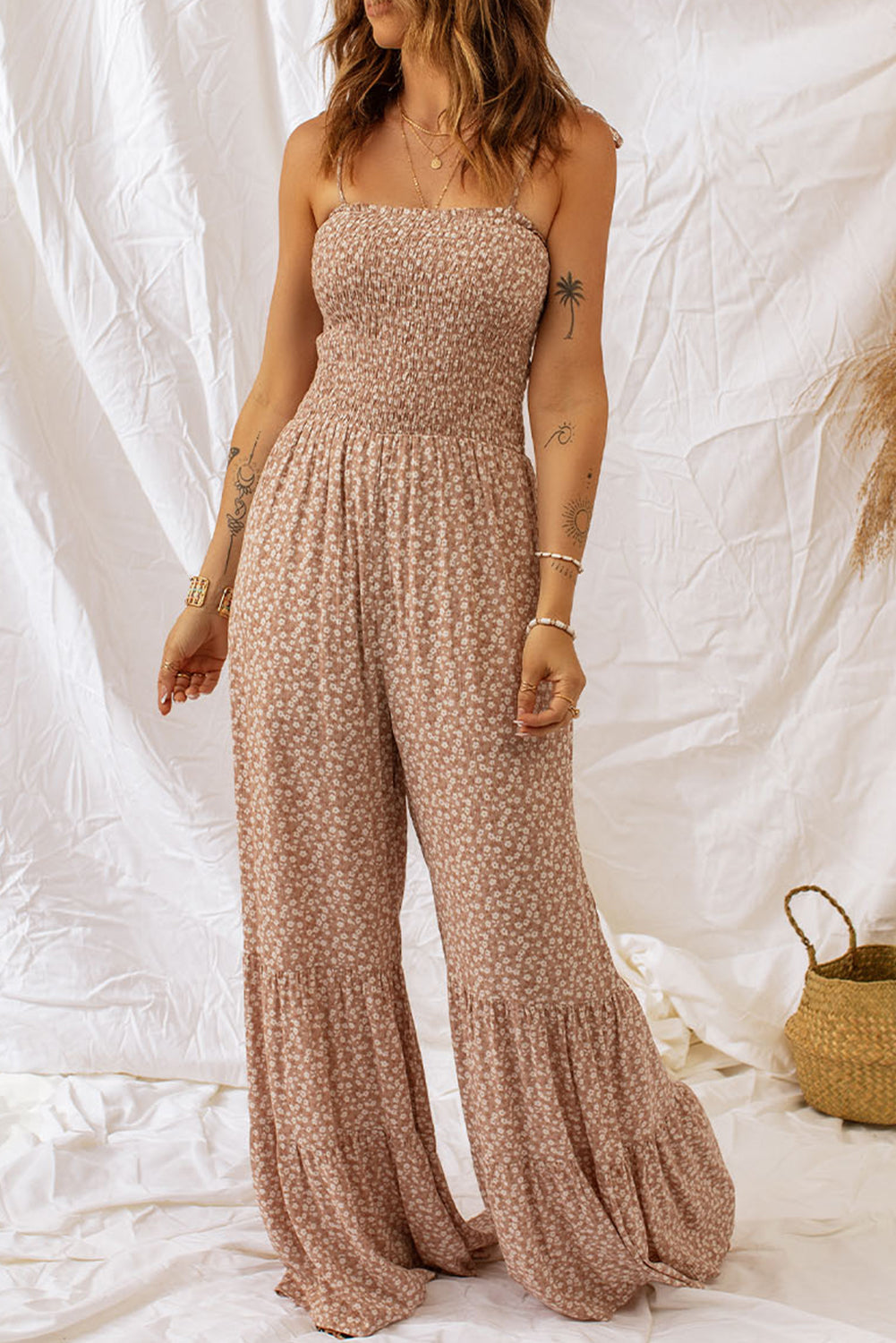 Floral spaghetti strap smocked wide leg jumpsuit, sleeveless, classy style.