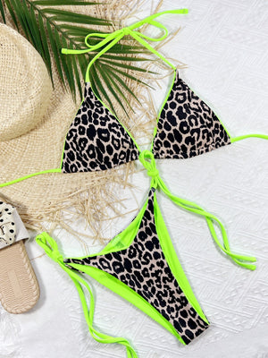 Leopard print halter neck tie side bikini set with neon green accents.