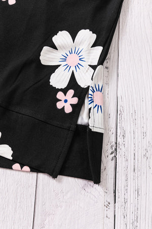 Printed side slit round neck tank with floral design.