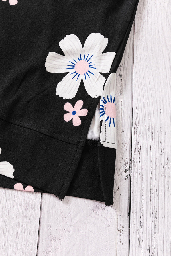 Printed side slit round neck tank with floral design.