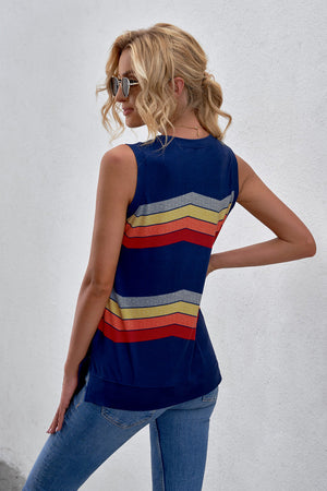 Sleeveless printed tank with side slit and round neck, featuring colorful stripes.