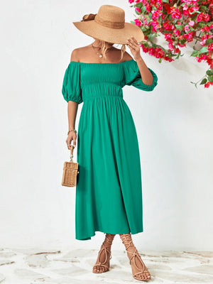 Chic off-shoulder balloon sleeve midi dress in solid green with A-line hem and puff sleeves.