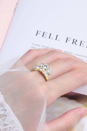 Moissanite ring in 925 sterling silver with platinum and 18K gold plating.